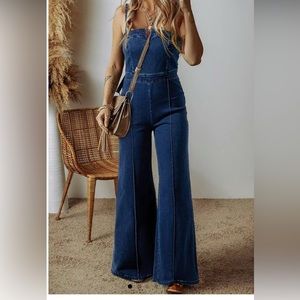 Sail Blue Seamed Zipper Spaghetti Strap High
Waist Flared Jumpsuit